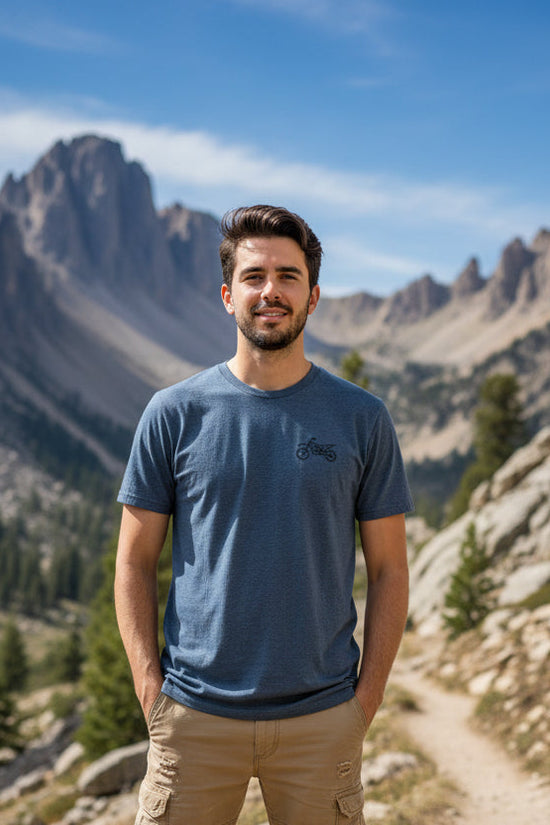 Blue t-shirt with a small graphic on the chest against a white background