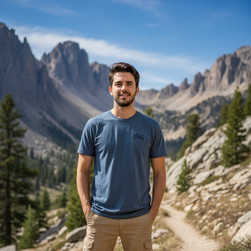 Blue t-shirt with a small graphic on the chest against a white background